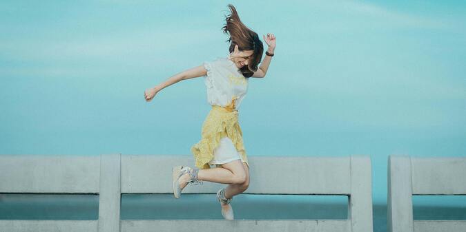 Bounce near a body of water for a woman